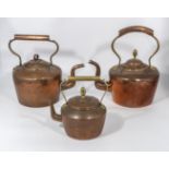 Three copper kettles