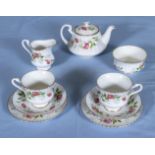 A decorative tea for two china tea set