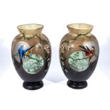 A pair of vases decorated with birds, 30cm tall A/F