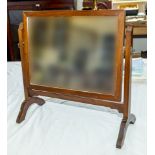 A mahogany toilet mirror