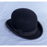 A bowler hat. 20cm front to back x 17cm