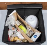 A storage box containing assorted items