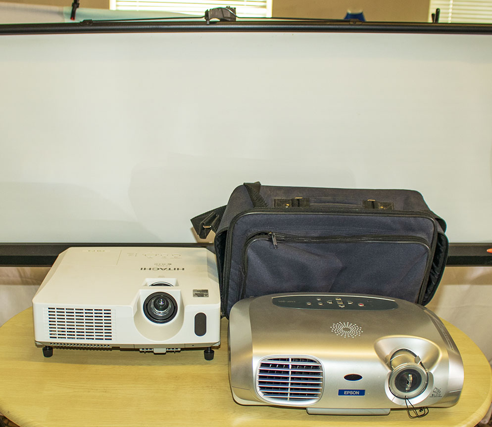 Two projectors and a screen