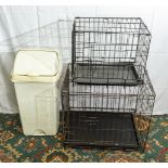 Two pet crates and a waste bin