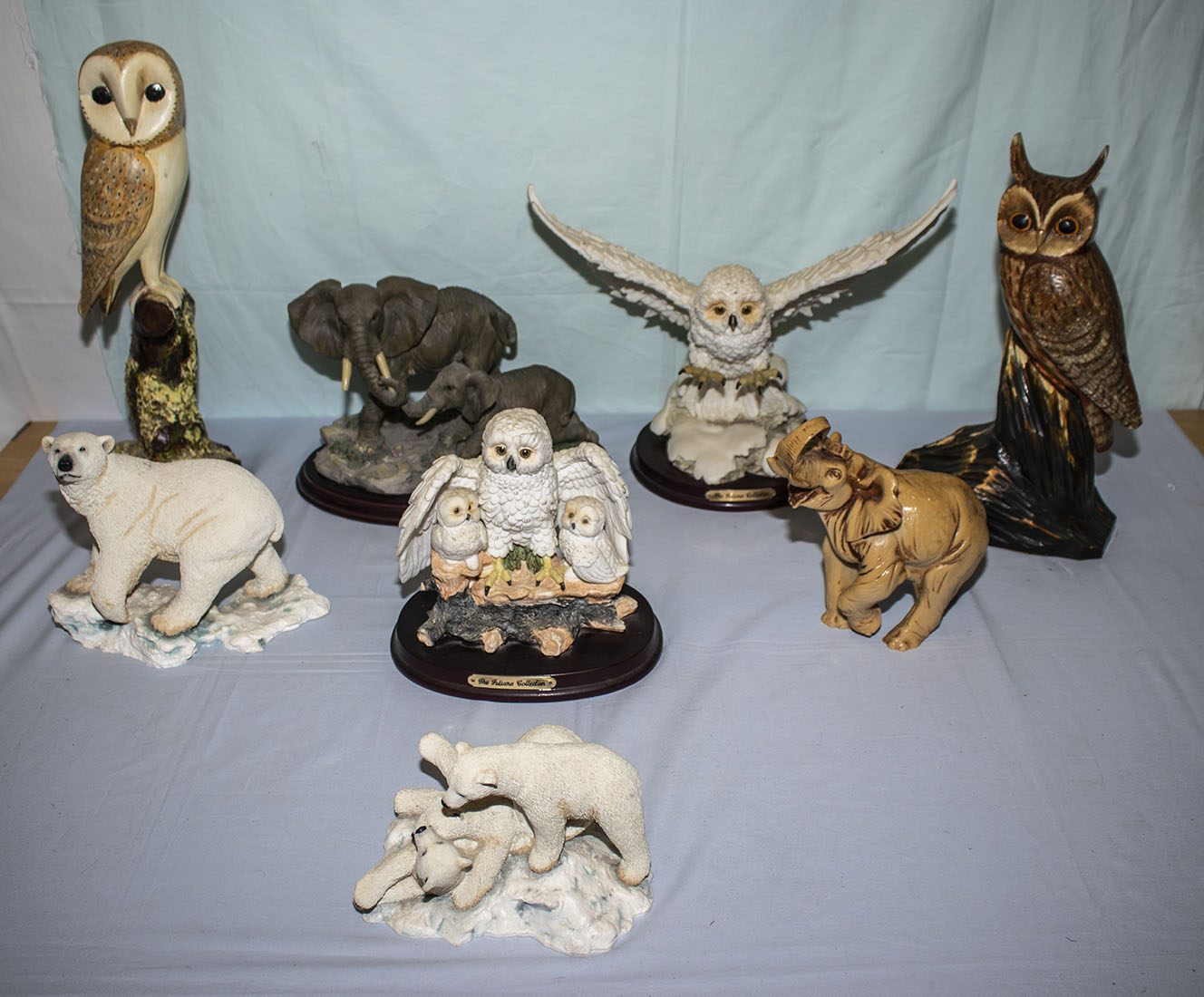 A collection of owls, bears and elephants