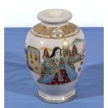 A Chinese vase decorated with figures, 19cm tall