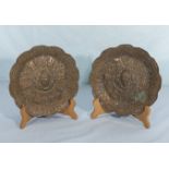 A pair of Tibetan embossed copper dishes
