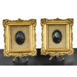 A pair of small gilt framed miniatures and brass stands, 25cm x 22cm