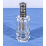 A heavy glass bottle oil lamp