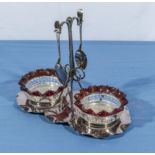A silver plated stand with ruby glass edged preserve dishes