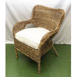 A wicker arm chair