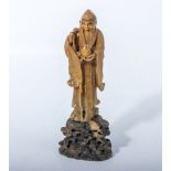 Antique Chinese soapstone figure of a deity holding a peach, 21cm tall