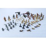 A collection of miniature lead soldiers and other items