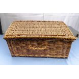 A wicker picnic basket