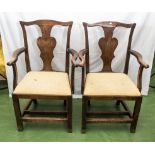 A pair of early oak elbow chair (one in need of restoration)