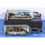 Two model ships in bottles, 28cm and 29cm