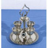 A silver plated eggcup stand