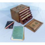 A vintage mahjong set in wooden carrying case