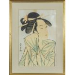 A framed Japanese woodblock print 38cm x 25cm