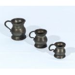 Three graduated miniature pewter tankards