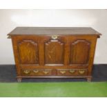 A Georgian period oak mule chest with style feet