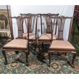 A set of four Victorian mahogany dining chairs