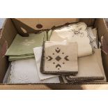 A box containing table linen and napkins