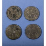 Four 1977 crowns