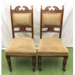 A pair of Victorian upholstered dining chairs