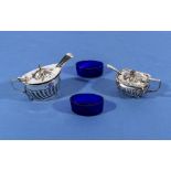 Two silver mustard pots, three spoons and two spare blue glass liners, marks for Sheffield and