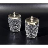Two cut glass silver plate lidded preserve jars