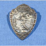 A Norwegian Stirling silver lapel badge bearing the motto Verg Ditt Land
