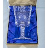 A Stuart crystal cut glass York Minster goblet with certificate