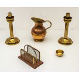 A pair of brass candlesticks, copper jug and a letter rack