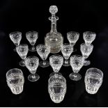 A crystal decanter and a selection of glasses