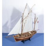A scratch built model galleon/ship flying a French flag possibly kit built 70cm long