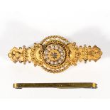 A Victorian 15ct gold brooch set with a diamond and seed pearls (4.5cm) together with a 9ct gold tie