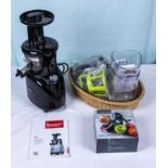 A Kuvings silent juicer and attachments