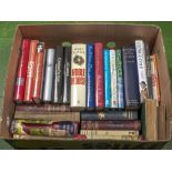 A box of assorted books and novels