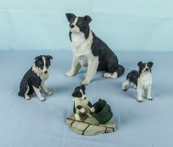 Four Collie dog figures