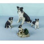 Four Collie dog figures