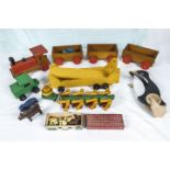 A box of vintage wooden toys, train transporter and other