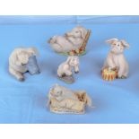 Five pottery piggin figures