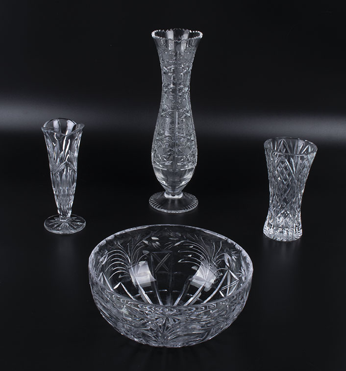 Three glass vases and a bowl