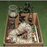 A box of assorted candle holders and other items