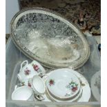 A plated tray and a tea set