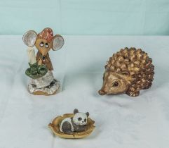 A pottery hedgehog money box, mouse and panda