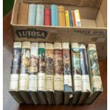 A box of vintage Rider Haggard hard backed books and other books by the author