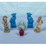 A pair of small temple dogs, two figures, ginger jar and a scent bottle