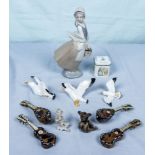 A Nao figure, three seagulls, four mandolins and others